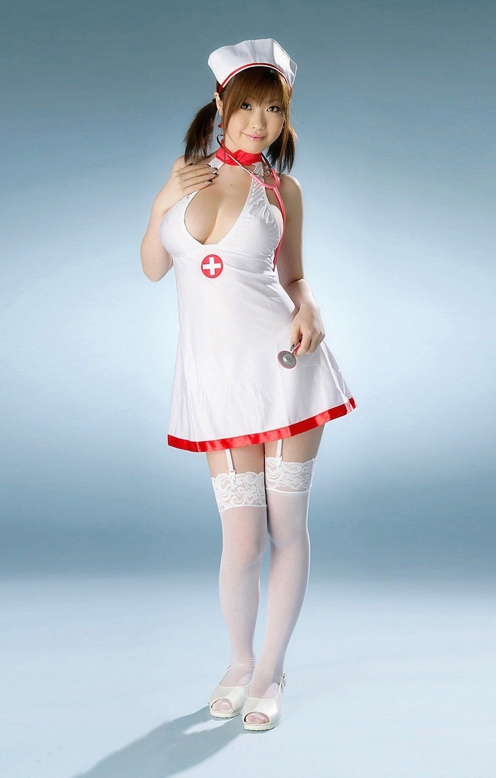 Auburn Asian Nurse wearing White Opaque Stockings and White Short Dress